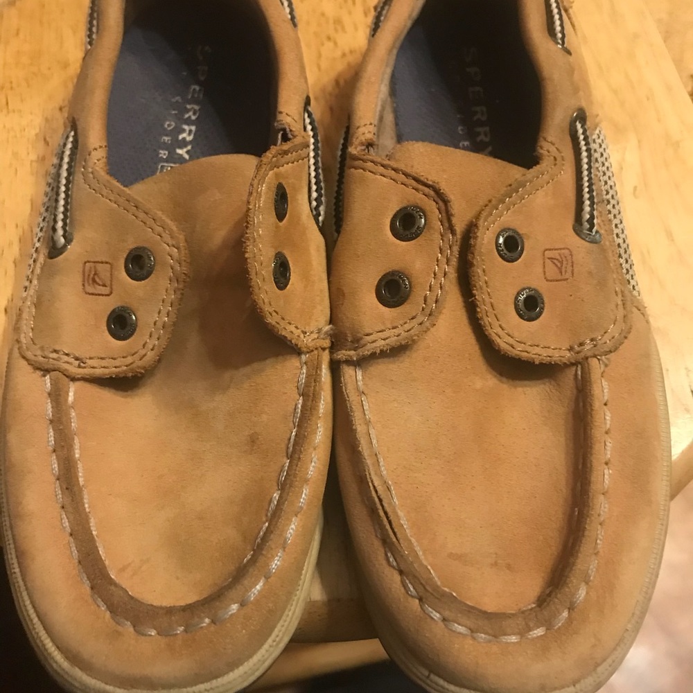 Boys Sperry tan suede loafers without laces.